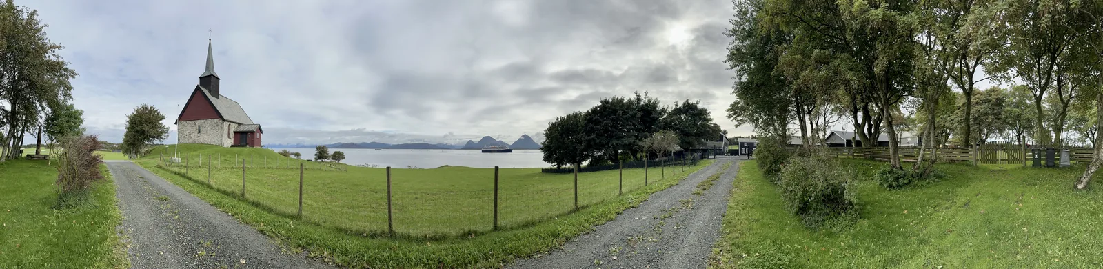 EDØYA (island) Smøla NORWAY - EDØY GAMLE KIRKE kyrkje (medieval church) Utsikt (view) Edøyfjorden (strait) Tustnafjella (mountains) kirkegård (cemetery) Edøy gård (farm) Kystruten Havila Pollux (ship) Distorted pano 2024-09 A